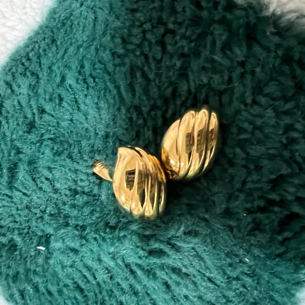 Gold Monet vintage ribbed crescent clip on earrings